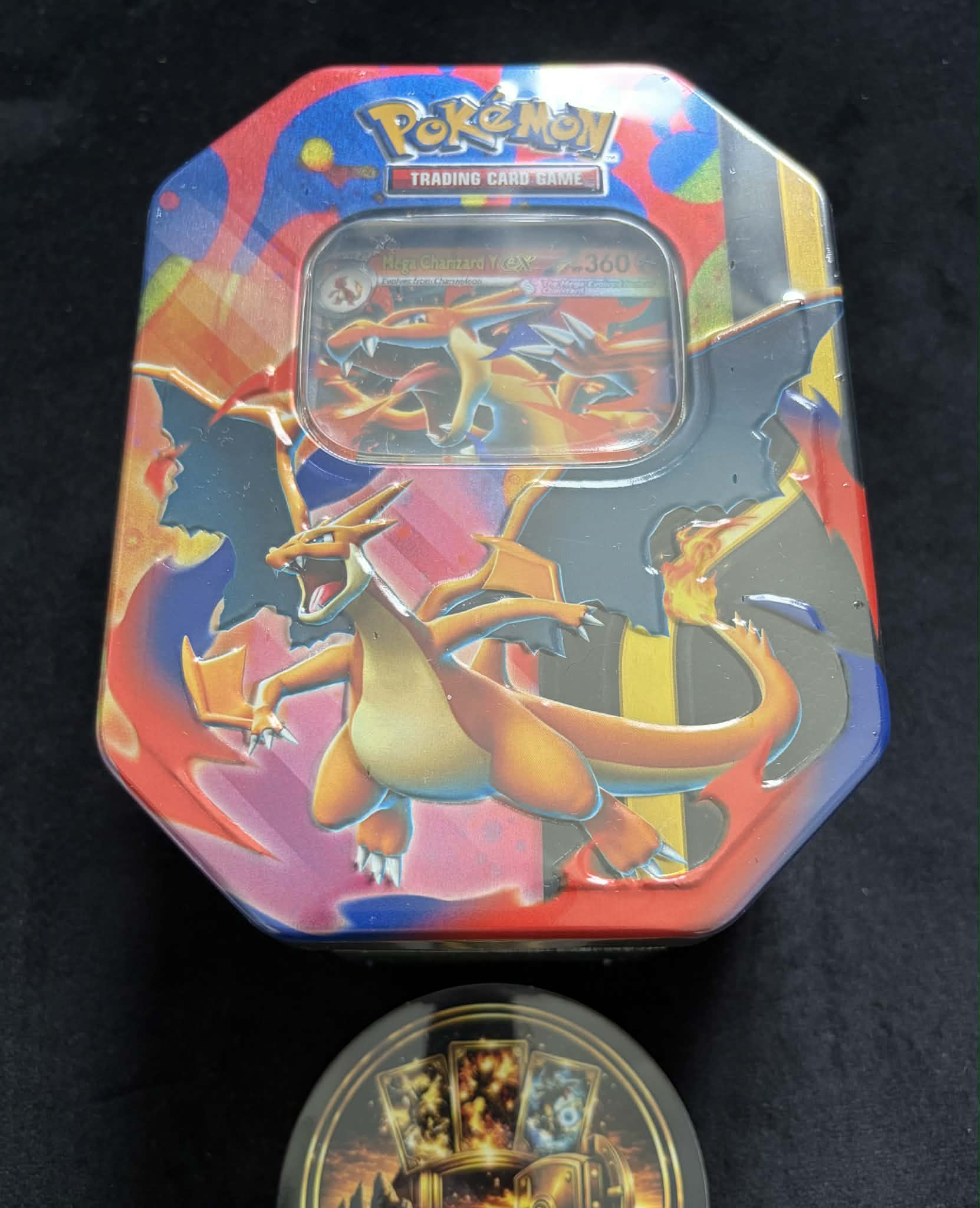 Mega Charizard Y EX tin and Mega Charizard X EX tin pair